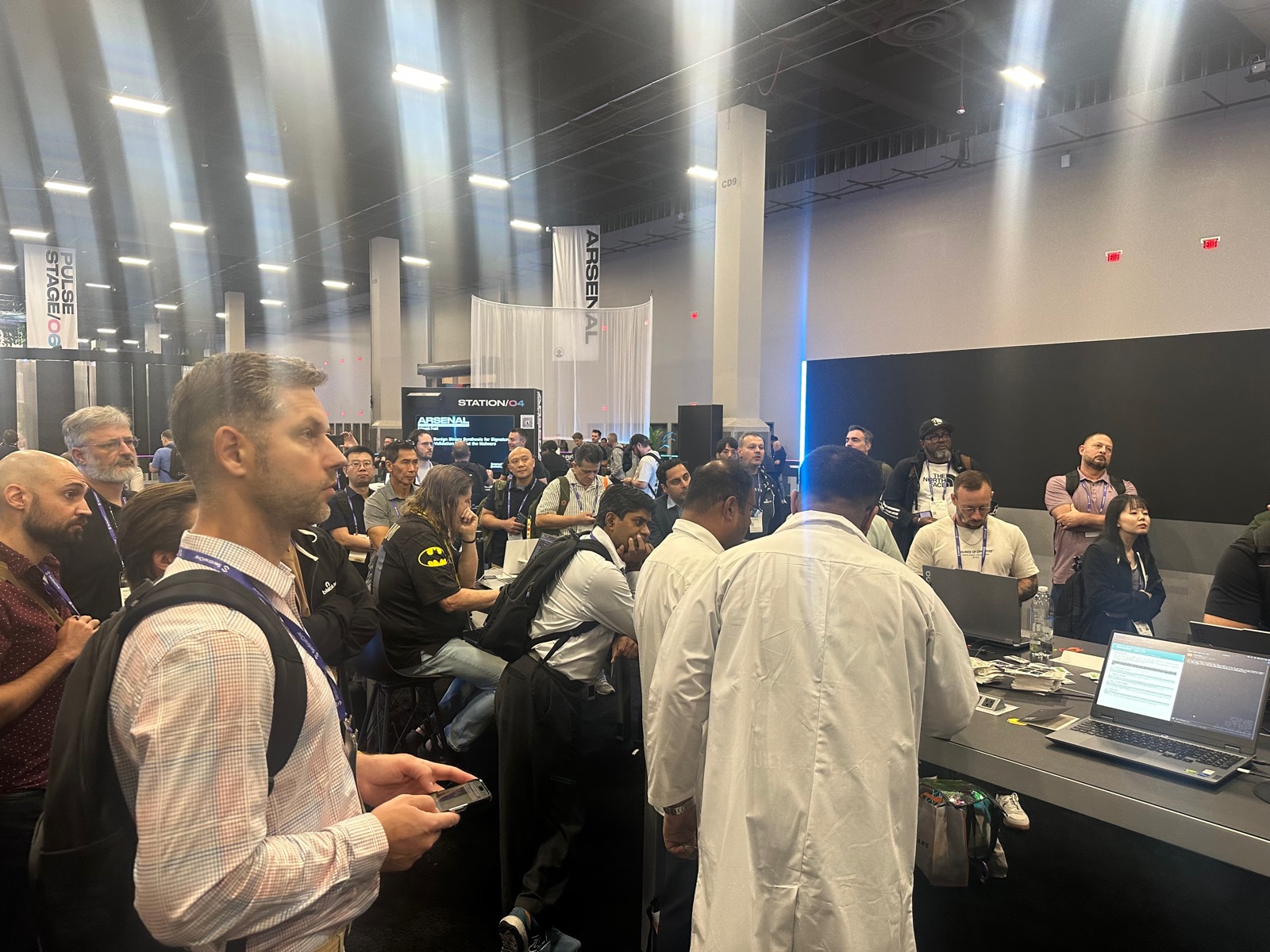 Wide shot of the Black Hat Arsenal floor and the Casky crowd